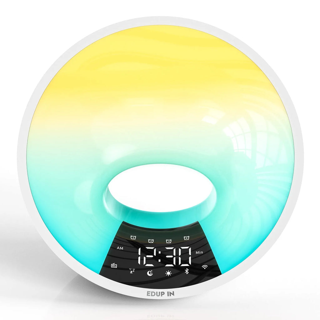 White WiFi smart sunrise alarm clock with dual alarm, FM radio, Bluetooth, and adjustable light on a bedside table