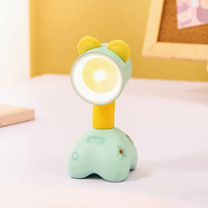 DIY magnetic cartoon small night lamp with multi-angle adjustable lighting on desktop