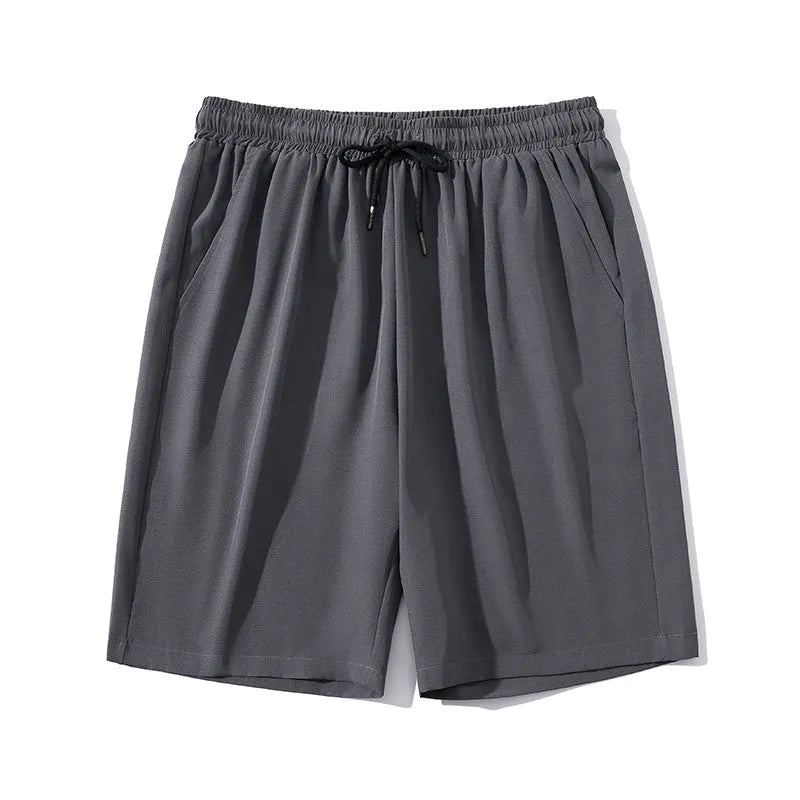 Men's black cropped sports pants with straight-leg cut and quick-drying nylon fabric