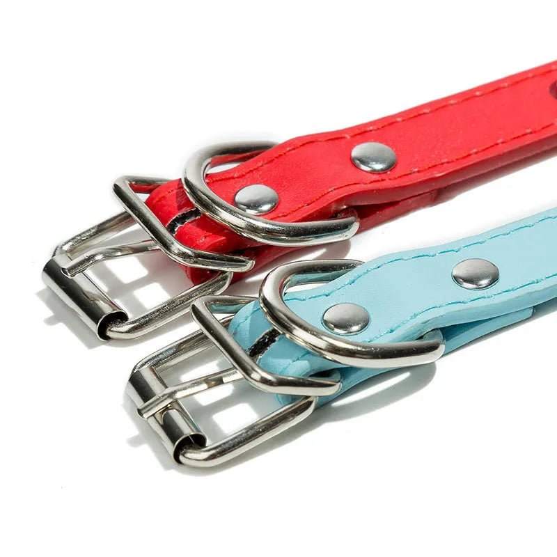 Spiked dog collar in thickened PU leather with metal studs, shown with alloy buckle, in one of six available colours.