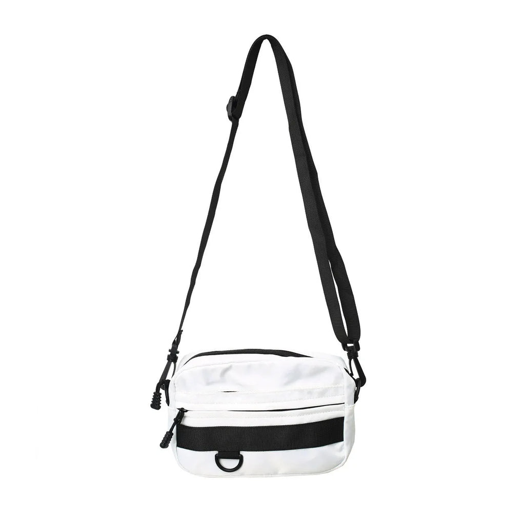 Men's street-style nylon messenger bag in a solid colour with adjustable crossbody strap.