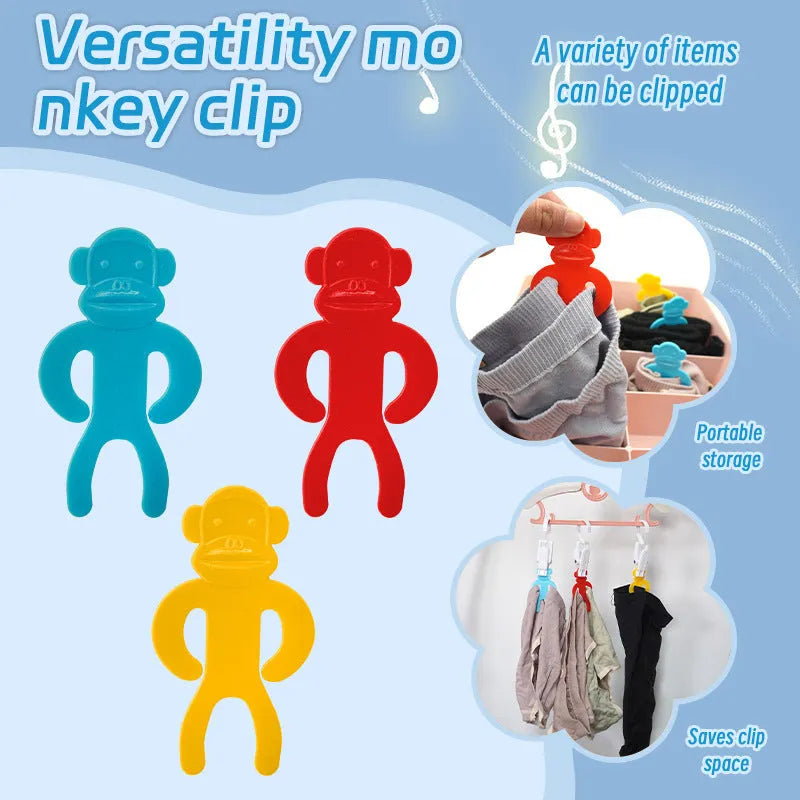 Plastic sock storage clips in blue, yellow, and red colours for organising laundry