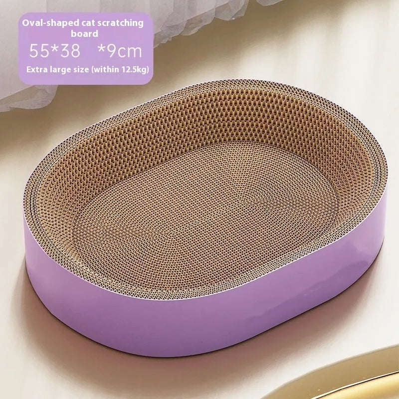Green oval corrugated paper cat scratch board and nest bed, 55 cm in diameter.