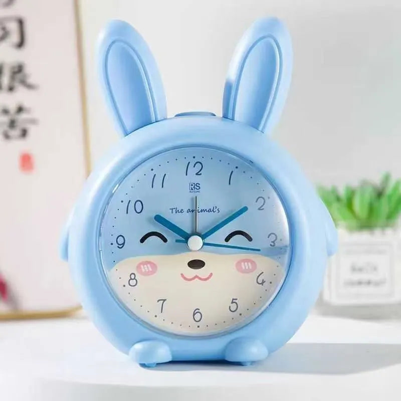 Creative fashion cartoon children's singing alarm clock in pink or blue with night light.