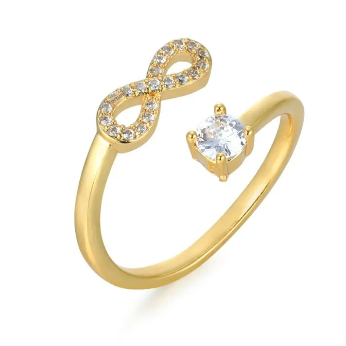 Personalised open ring with a zircon letter on a geometric gold metal band