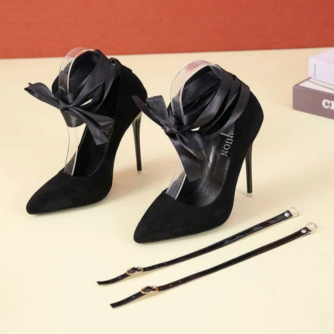 Women's black pointed toe platform heel with an ankle strap on a size 40 shoe.