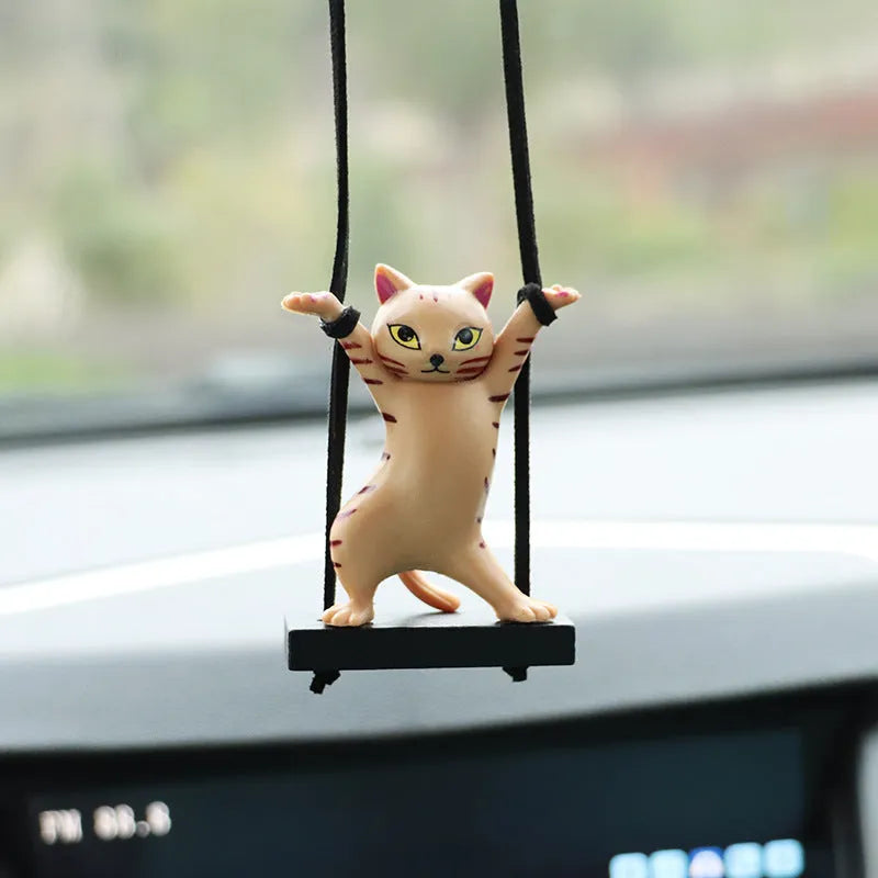 Cartoon-style resin cat pendant on an adjustable rope for car interior decoration.