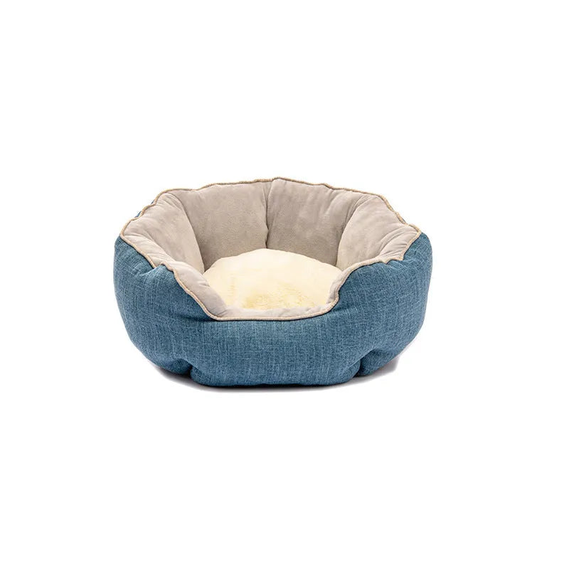 Blue octagonal pet bed with raised sides and a removable mat, for a small dog or cat.