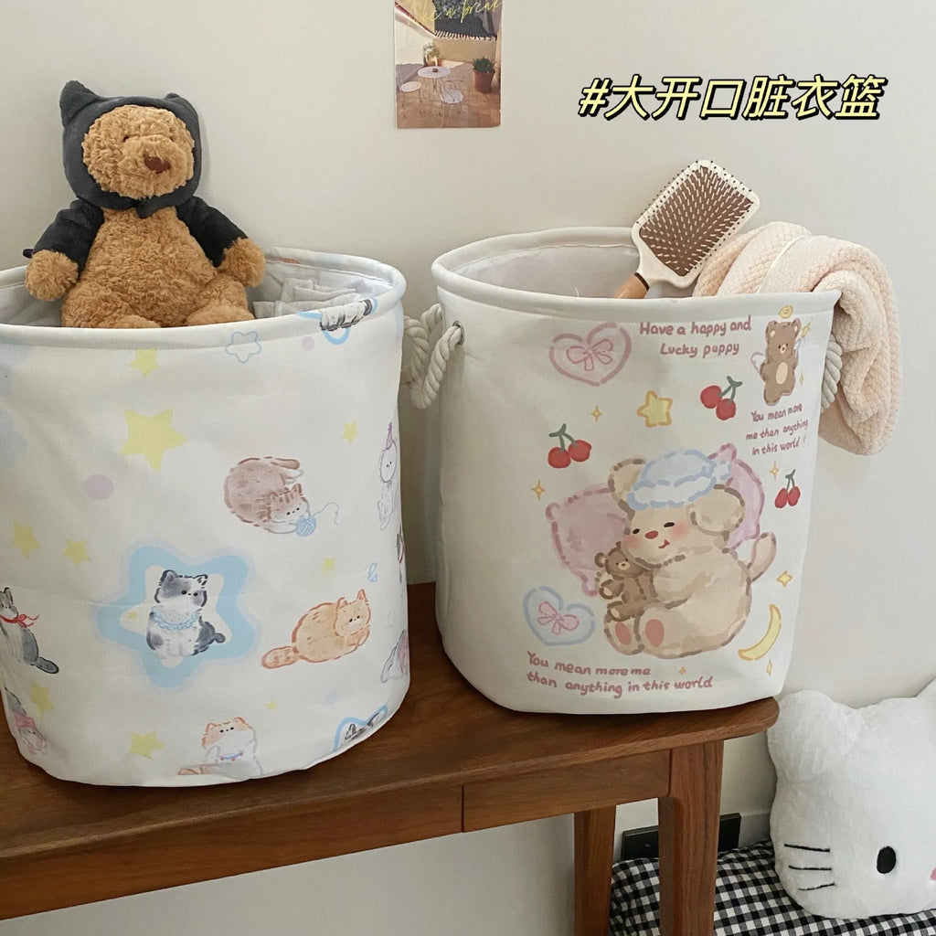 Foldable cotton cloth laundry basket in a character print colour, shown unfolded for use.