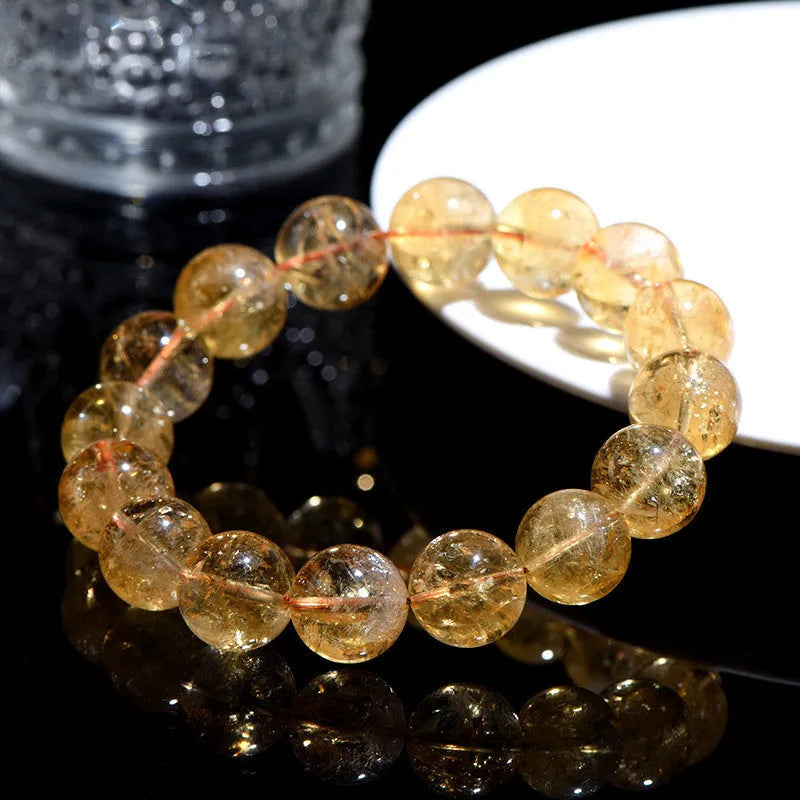 Natural yellow citrine bead bracelet showing geometric stone shapes in single circle and three circle configurations