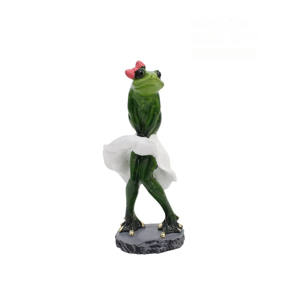 Pastoral style green resin frog decoration figurine on a wooden shelf.