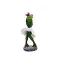Pastoral style green resin frog decoration figurine on a wooden shelf.