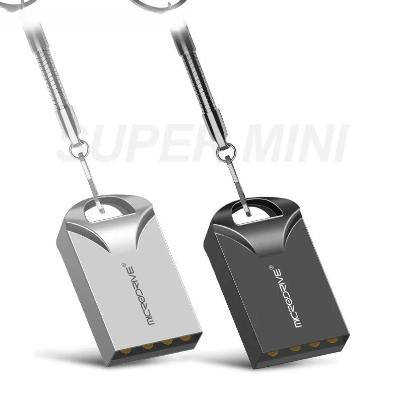 Small black and silver metal USB flash drive showing compact size next to a ruler for scale.