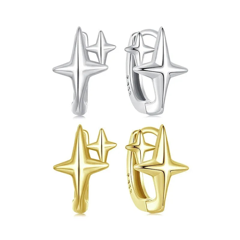 Sterling silver minimalist star ear clips with oxidised finish and XINGX symbol design
