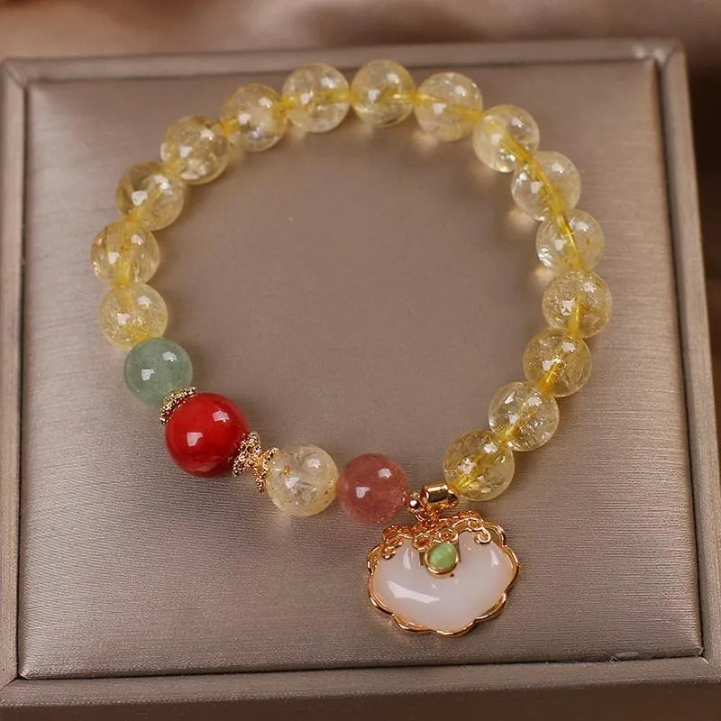 Women's natural citrine jade ruyi pendant bracelet with yellow hair crystal detail on alloy chain