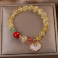 Women's natural citrine jade ruyi pendant bracelet with yellow hair crystal detail on alloy chain
