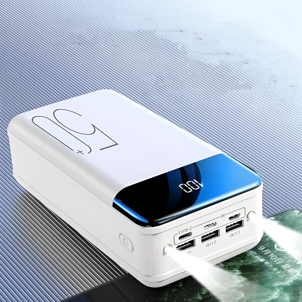 Large capacity 50000mAh power bank with three USB ports in black or white plastic casing