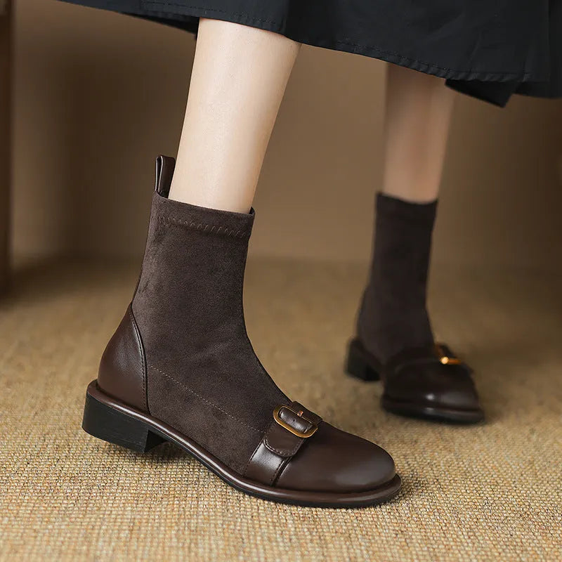 Women's black low heel Martin ankle boots with lace-up front and buckle stitching detail