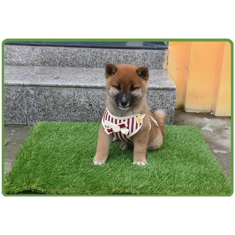 Washable artificial grass pet training mat for dogs and cats on a tiled floor.