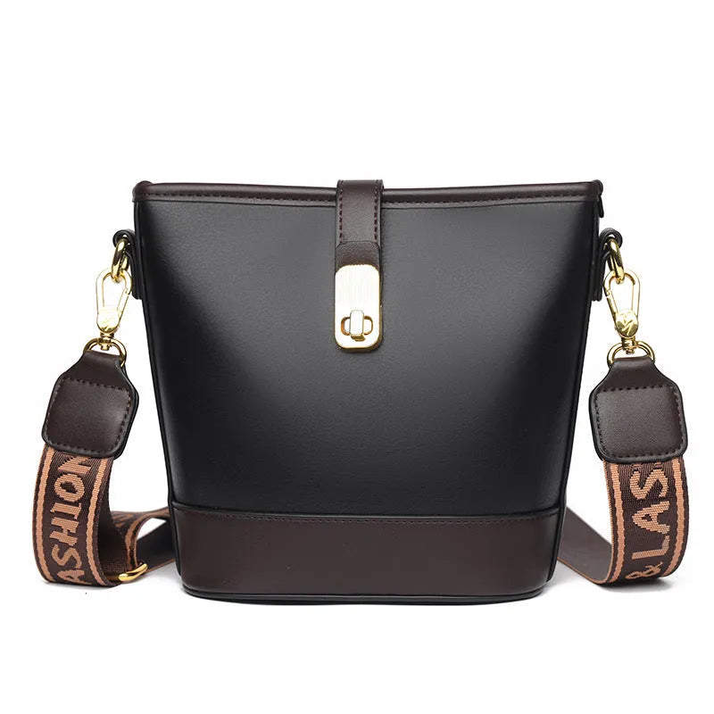Korean style soft PU bucket messenger bag with double shoulder straps in black colour showing sandwich pocket and sewing thread details
