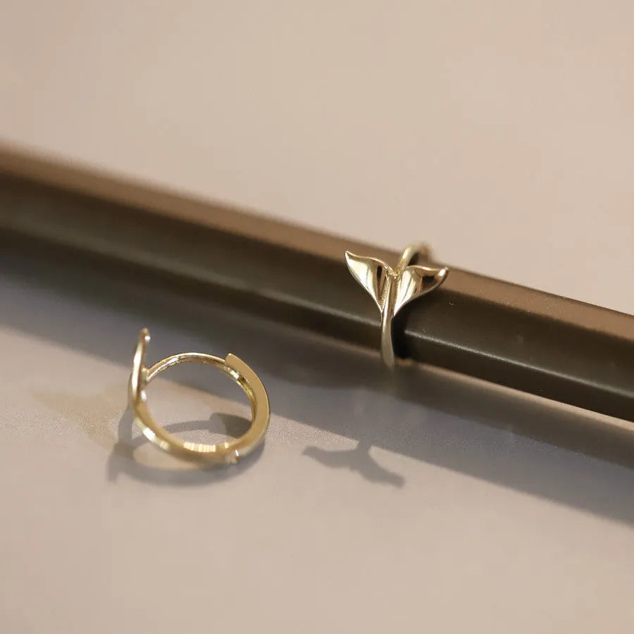 Gold and white gold fishtail hoop earrings made from 925 sterling silver