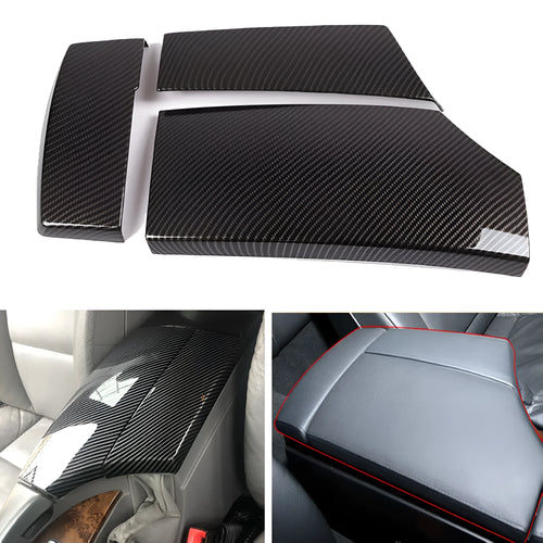 Set of three black ABS armrest box covers with a diagonal carbon fibre pattern and shiny finish.