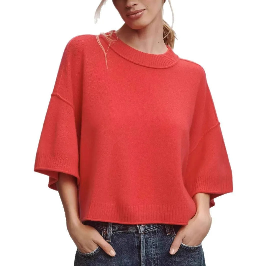 Women's red short t-shirt with V-neck and regular sleeves on white background