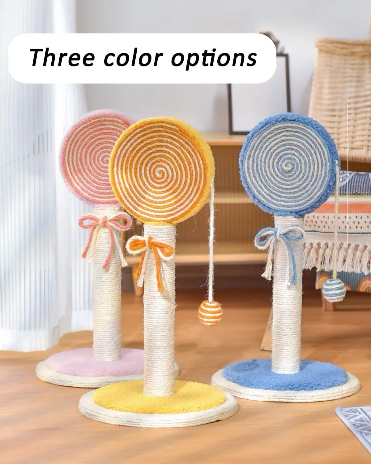 Blue cat scratching post with natural sisal rope and hanging ball on sturdy base