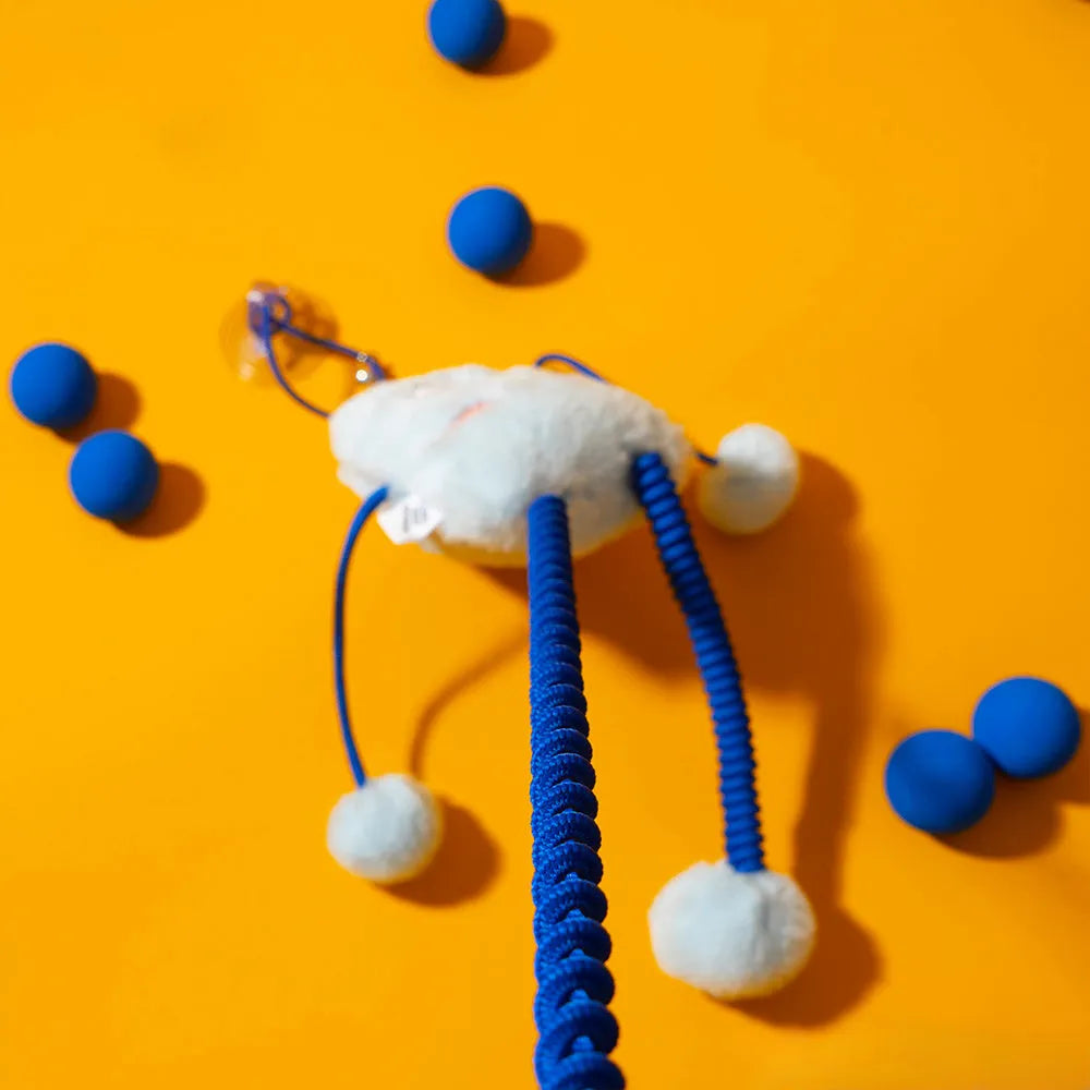 Blue cat plush toy with telescopic elastic pole, mint bell ring, and elastic rope on 30×30 cm base