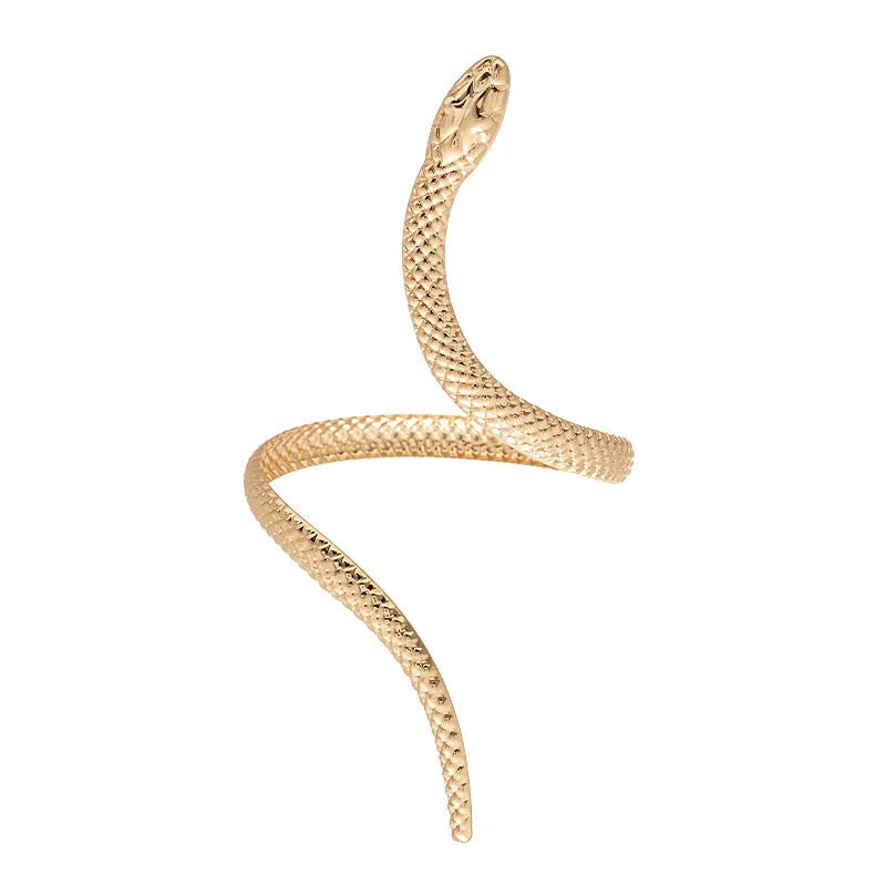 Gold tone snake-inspired bracelet and ring set with exaggerated twisted winding design on white background