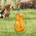Orange and white portable pet water feeder showing water bottle and treat container compartments