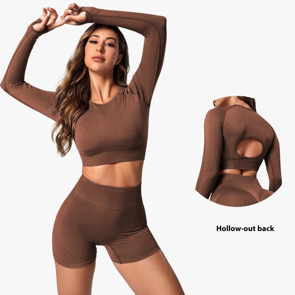 Women's black high waist yoga suit with long sleeves, consisting of matching top and pants