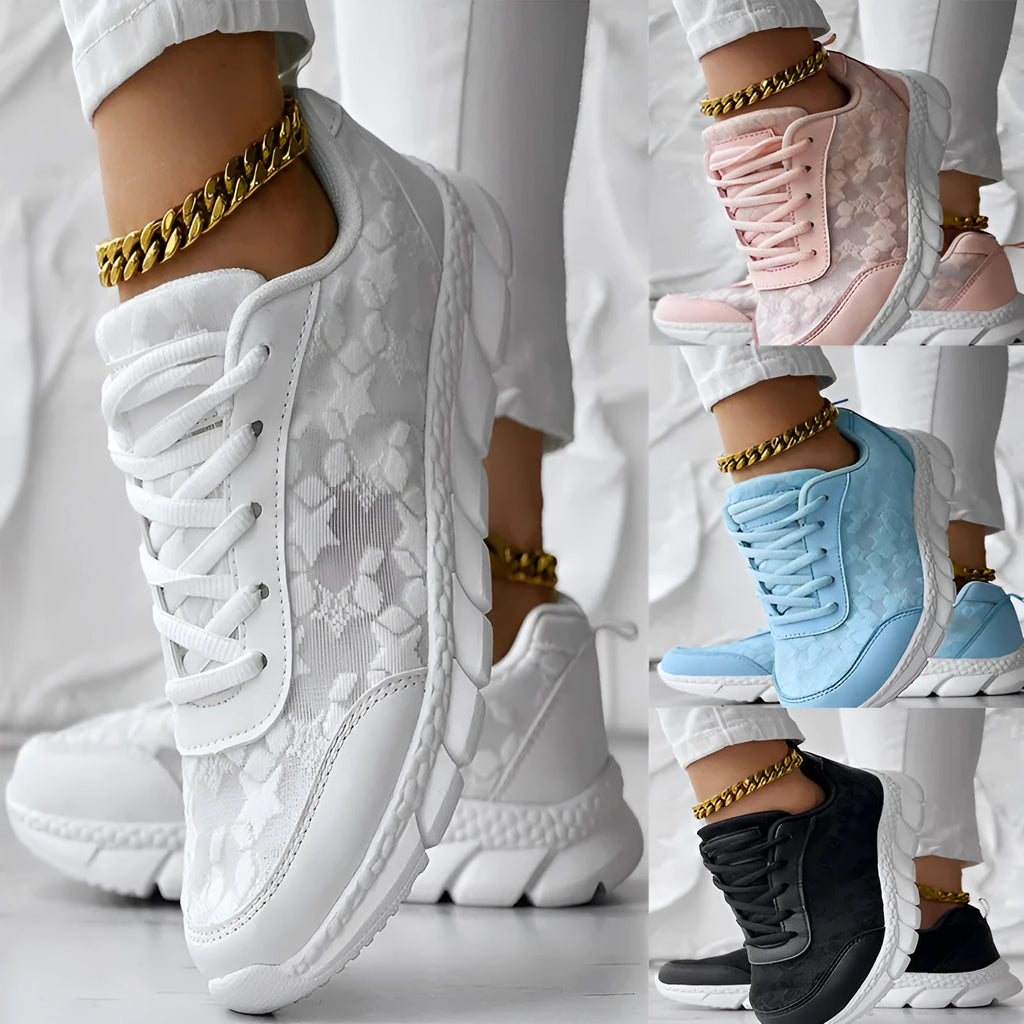 Women's canvas running shoes in white with round toe and flat heel design