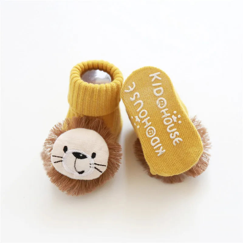 Cotton baby floor socks with non-slip soles in a pink bow print design.