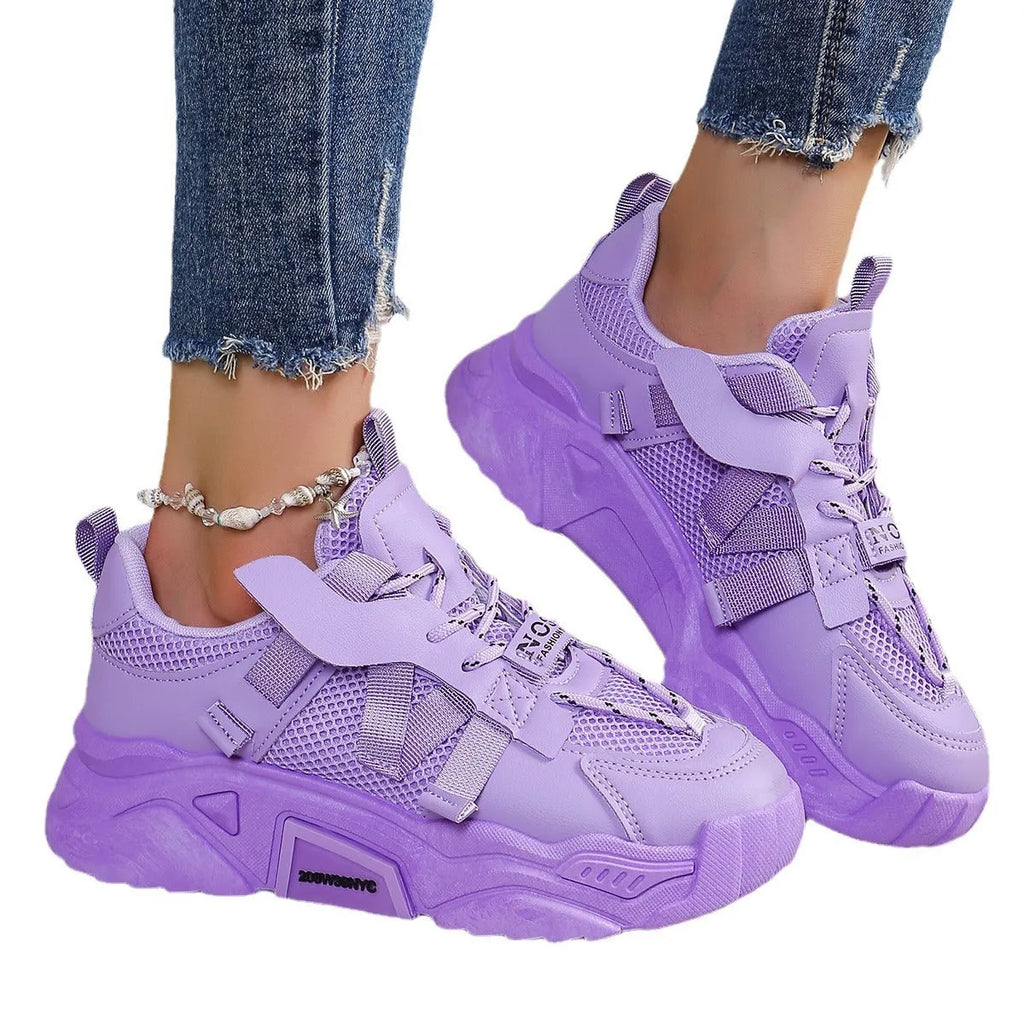 Women's purple platform mesh dad shoes with lace-up front and thick sole.