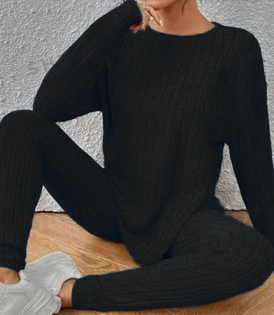 Black sunken stripe two-piece lounge set for women, showing top and pants.