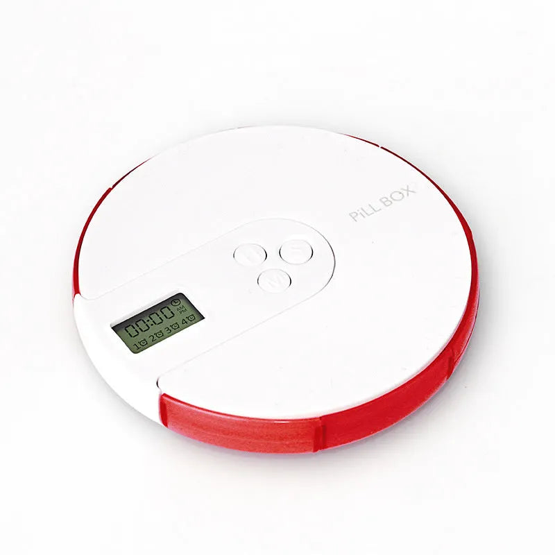Blue 7-compartment alarm clock pill dispenser showing timer display and open lid with compartments.