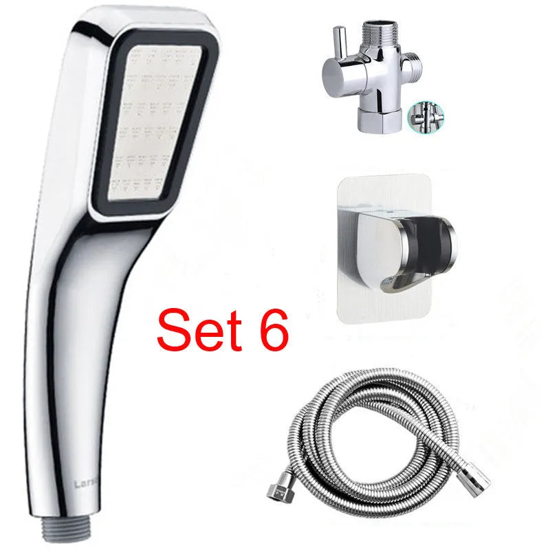 Hand-held pressurised rain shower head in orange and seven set configurations