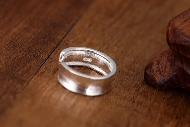 Adjustable opening geometric frosted sterling silver ring with open design