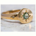 Gold-coloured adjustable ring with a detailed star and oval asterism zircon design.