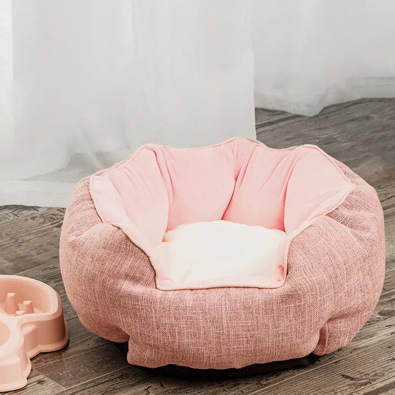 Blue octagonal pet bed with raised sides and a removable mat, for a small dog or cat.