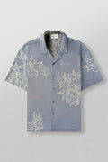 Men's loose floral print short-sleeve casual top in light colour on hanger