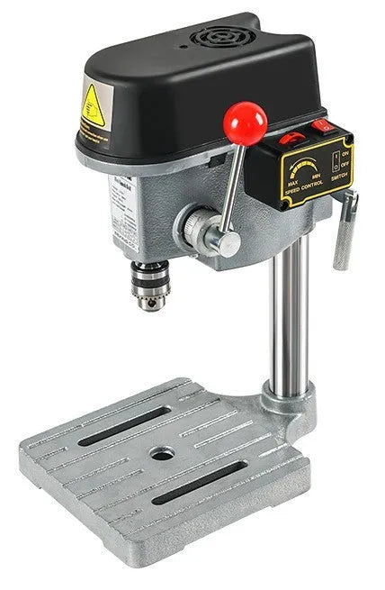 Mini bench drill and milling machine with heavy-duty bench pliers on a workbench.