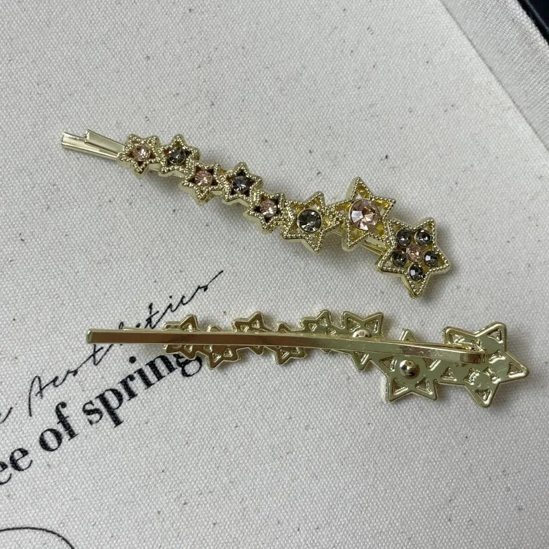 Gold electroplated alloy rhinestone barrettes with side clip bangs design and five-pointed star charms