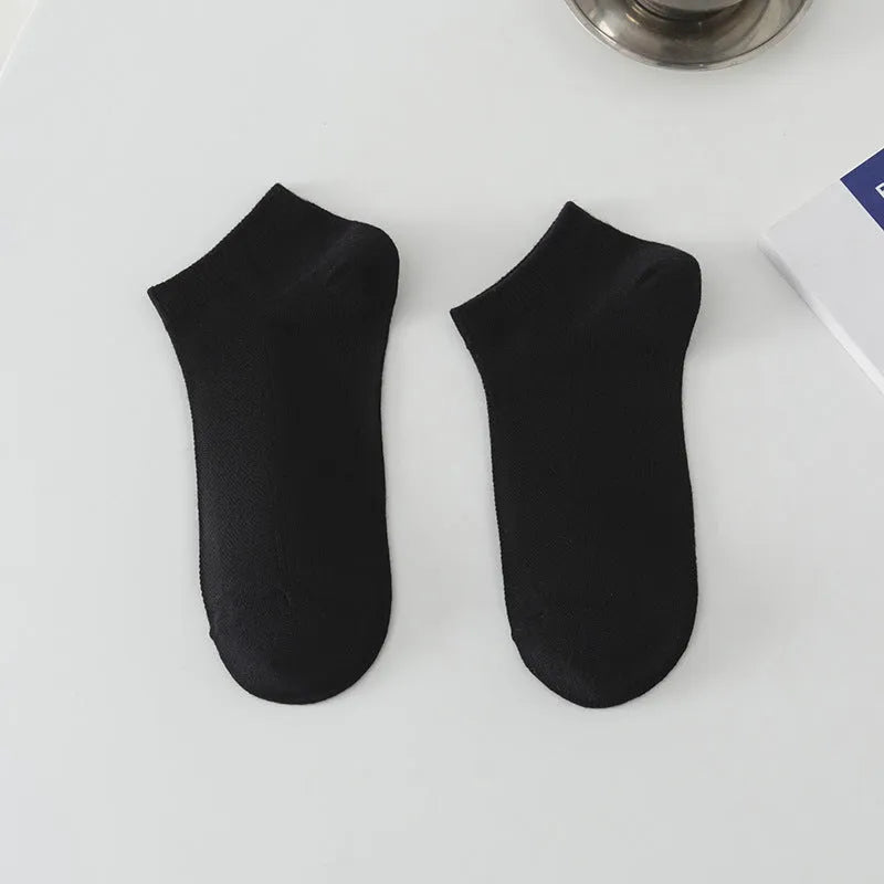 Men's solid colour polyester low-cut boat socks shown in multiple colour options