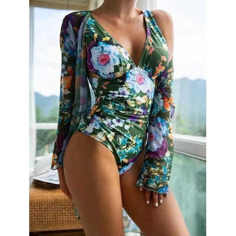 Women's floral print bikini three-piece set with halter-neck top and matching cover-up