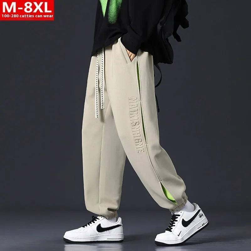Men's loose-fit cotton trousers with ankle banded design in grey green colour