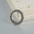 Retro heart-shaped and lotus magnetic earrings in stainless steel with antique finishes