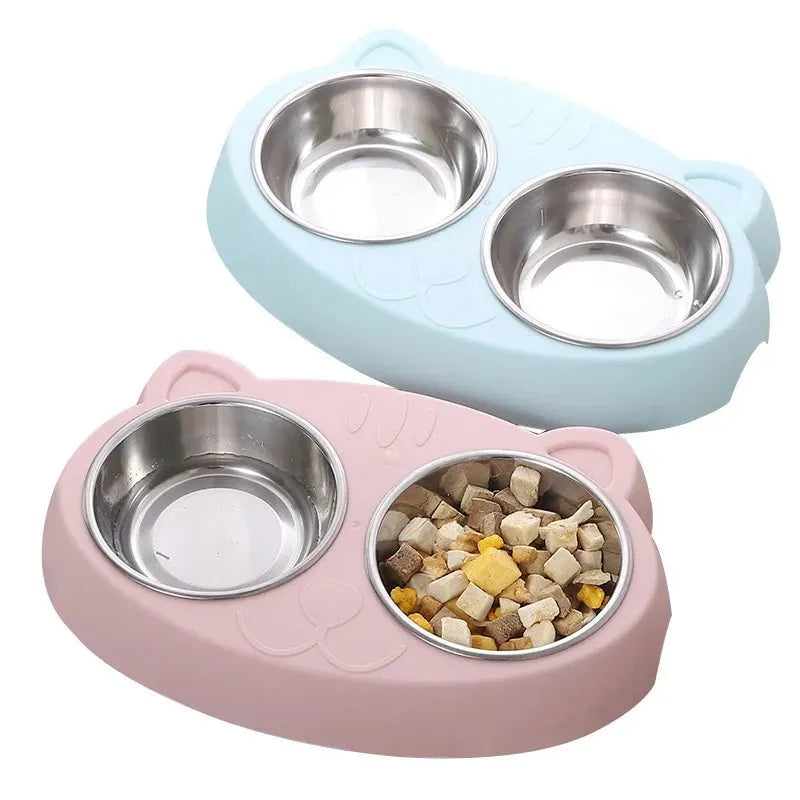Blue plastic double bowl pet feeder tray with non-slip feet for holding cat or dog food and water dishes.