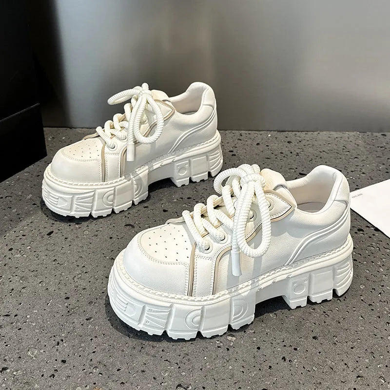 Women's beige and pink casual leather shoes with a rubber foam sole on a white background